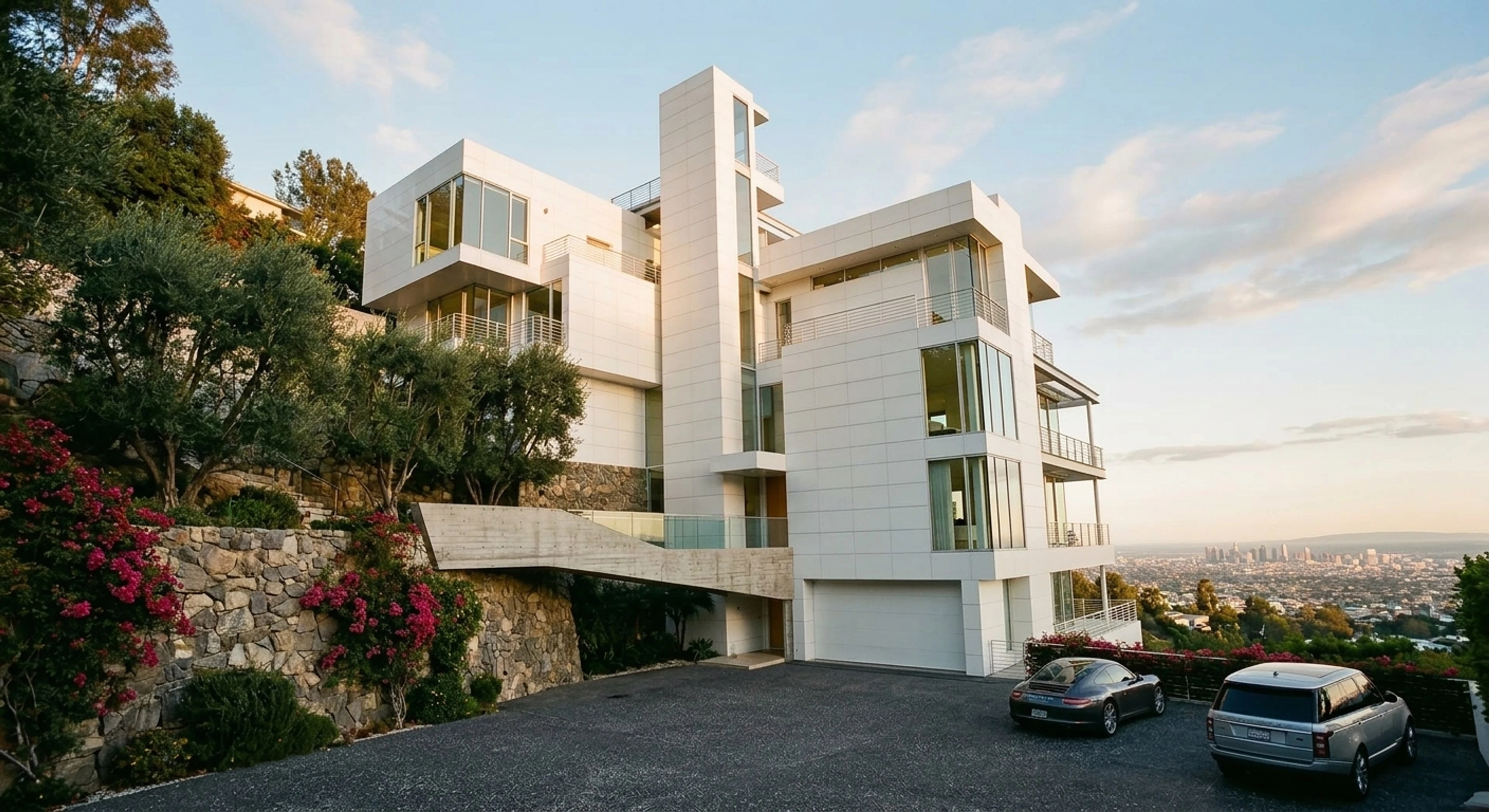 A stacked white Bel Air mansion clings to the ridge, its orthogonal volumes corrected into pure architectural geometry. — enhanced by Plotpane