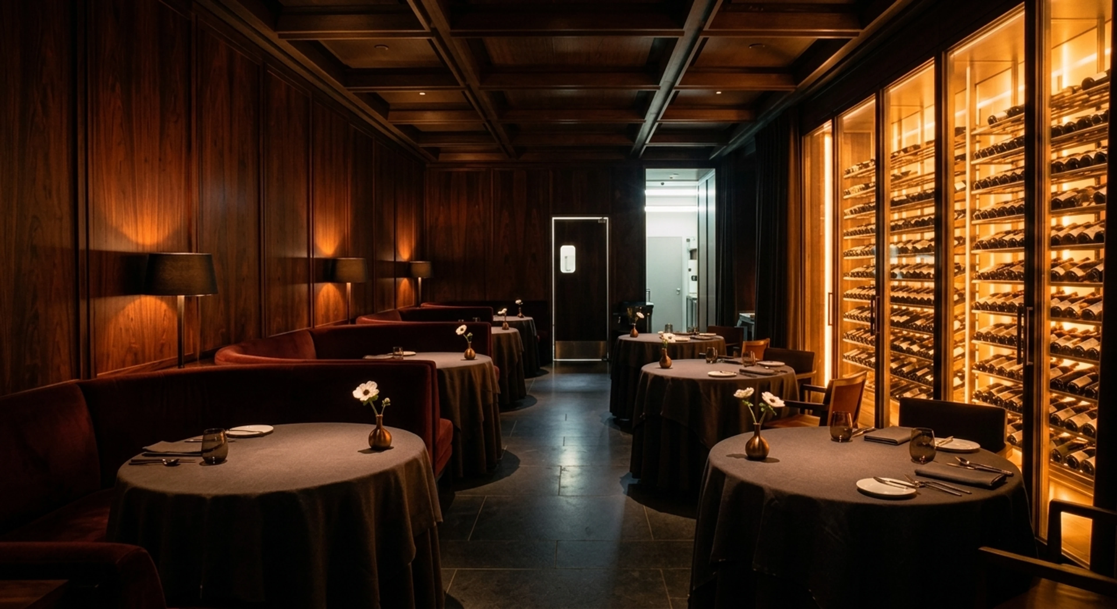 A dark, intimate Michelin-starred dining room recovers its velvet depth and glinting crystal without losing its secret-club shadow. — enhanced by Plotpane